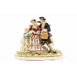 A Dresden art German porcelain figure group, polychrome. Height 22 cm.