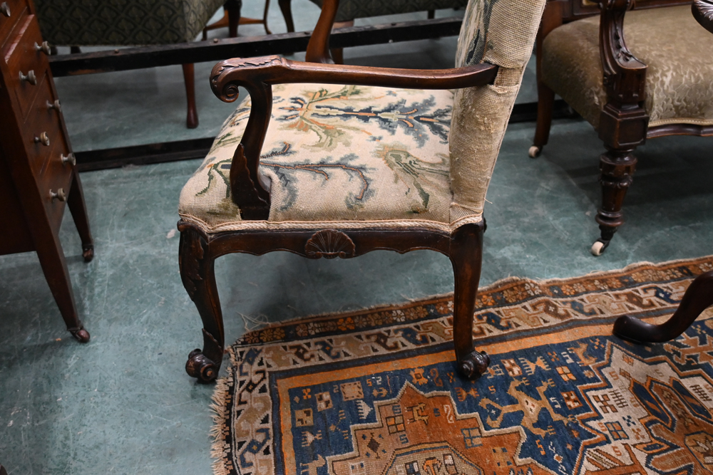 An 18th century armchair, with upholstered back and seat and with foliate carved outswept arms, - Image 7 of 9