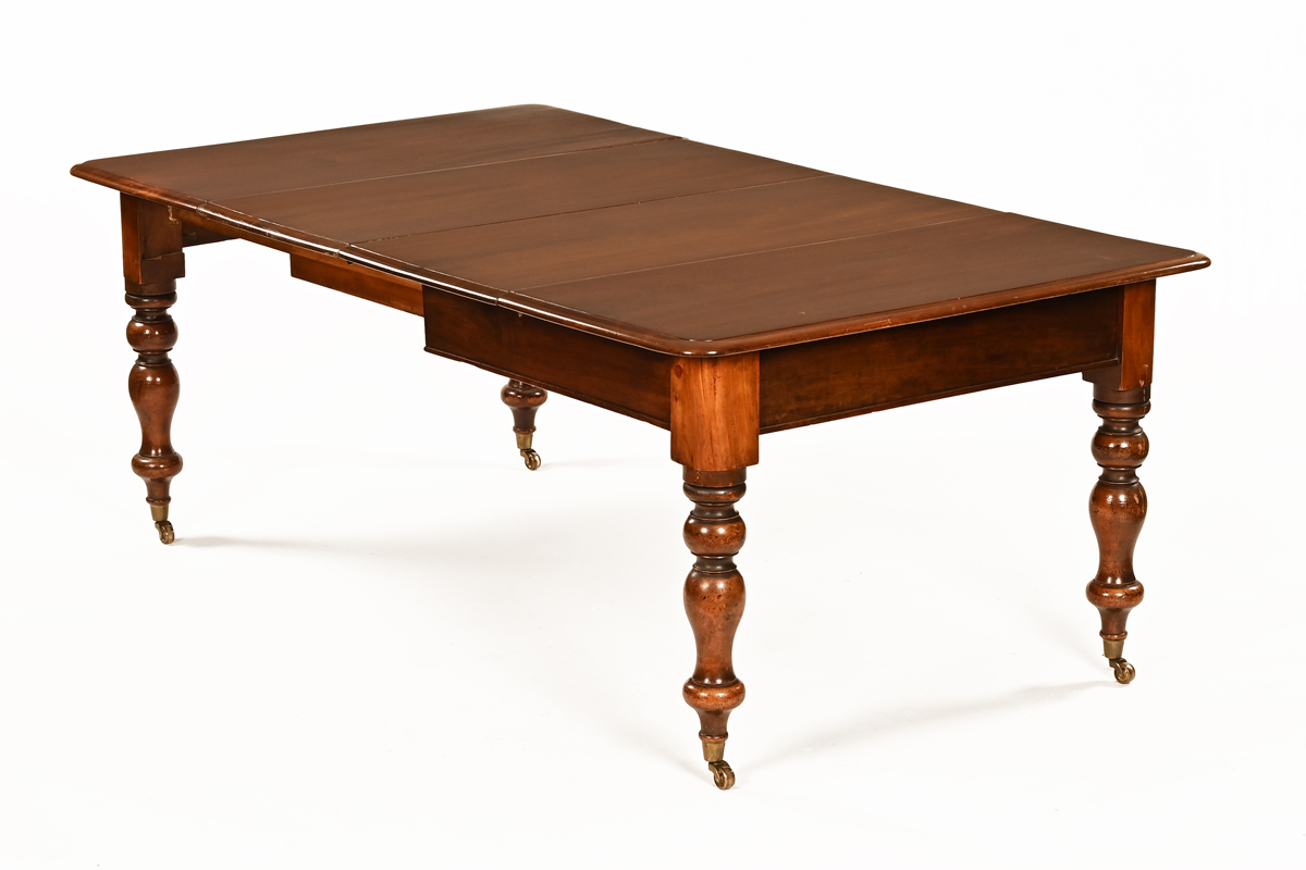 A Victorian mahogany dining table,