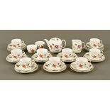 A Royal Worcester "Astley" tea set, comprising teapot, 12 plates, 9 cups, 10 saucers,