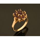 A 9 ct gold amethyst cluster ring. Size N. 3.8 grams.