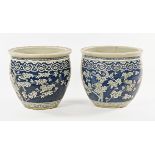 A large pair of Chinese blue and white jardinieres (AF). Height 36 cm, diameter 41 cm.
