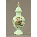 A late Victorian glass vase and cover, decorated with birds. Height 44 cm.