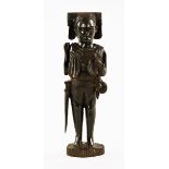 An African carved hardwood figure. Height 53 cm.