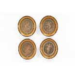 After Bartolozzi, four oval coloured engravings cherubs, each in oval gilt frame.