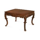 A Chinese carved hardwood table, with moulded edge carved frieze and raised on cabriole legs.
