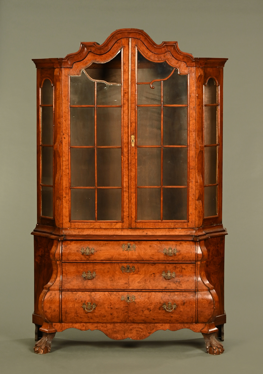 A 19th century Dutch bombe walnut bookcase,