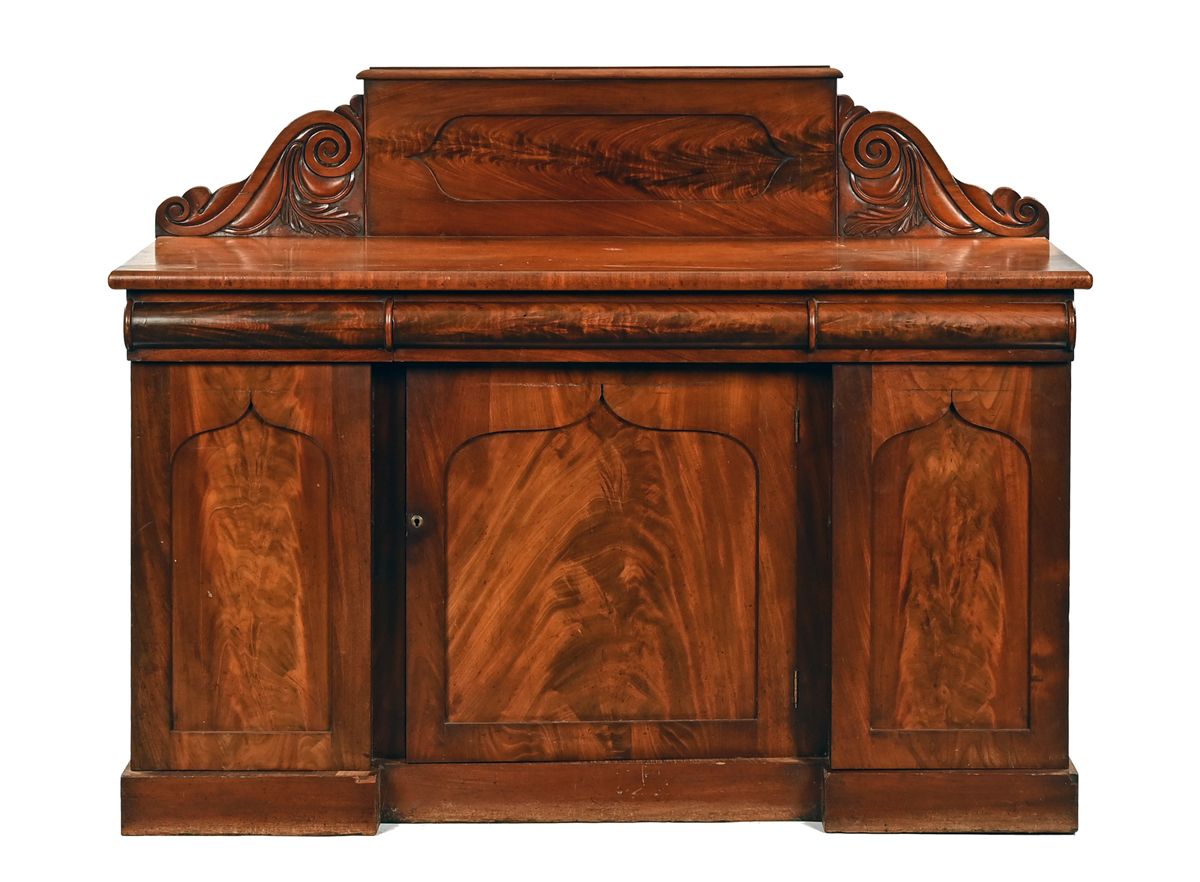 A Victorian mahogany sideboard, with rear upstand frieze drawers,