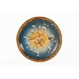A 20th century Japanese Satsuma charger, with gilt floral and bird decoration. 29 cm diameter.