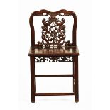 A 19th century Chinese hardwood low backed occasional chair, with square legs and stretchers.