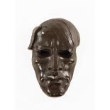 20th century painted plaster death mask of a young man. Length 28 cm.