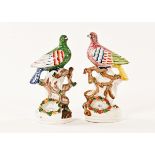 A pair of 19th century Staffordshire pigeons, on branch and nest with eggs. Each height 23 cm.