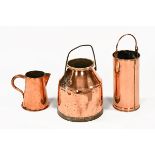 A 19th century copper milk pail, a large jug and cylindrical vessel. Tallest 38.5 cm.