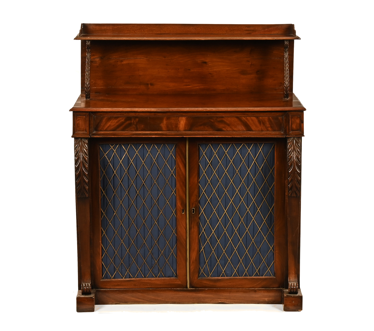 An early 19th century mahogany side cabinet, the upper tier with single shelf,