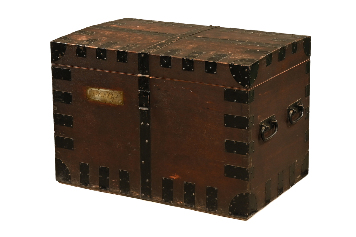 A large 19th century metal bound silver trunk, with carrying handles to either side.