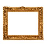 A good 19th century giltwood and gesso picture frame, in the rococo style, aperture 70 cm x 90.
