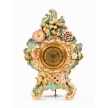 A 19th century porcelain cased mantle clock,