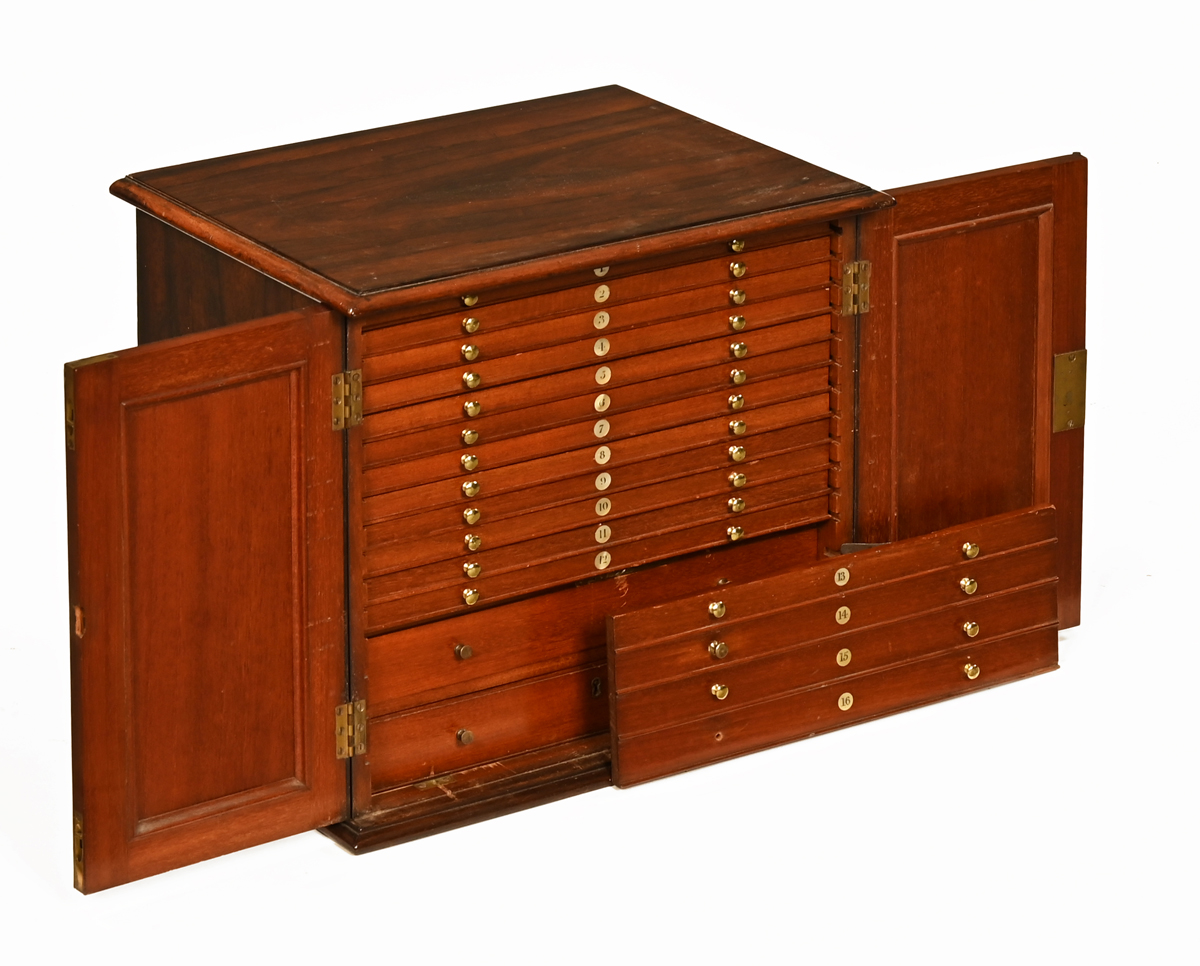 An early 19th century rosewood table top coin cabinet,