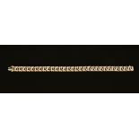 A 9 ct gold and diamond bracelet. Weight 11.4 grams, stamped 375.
