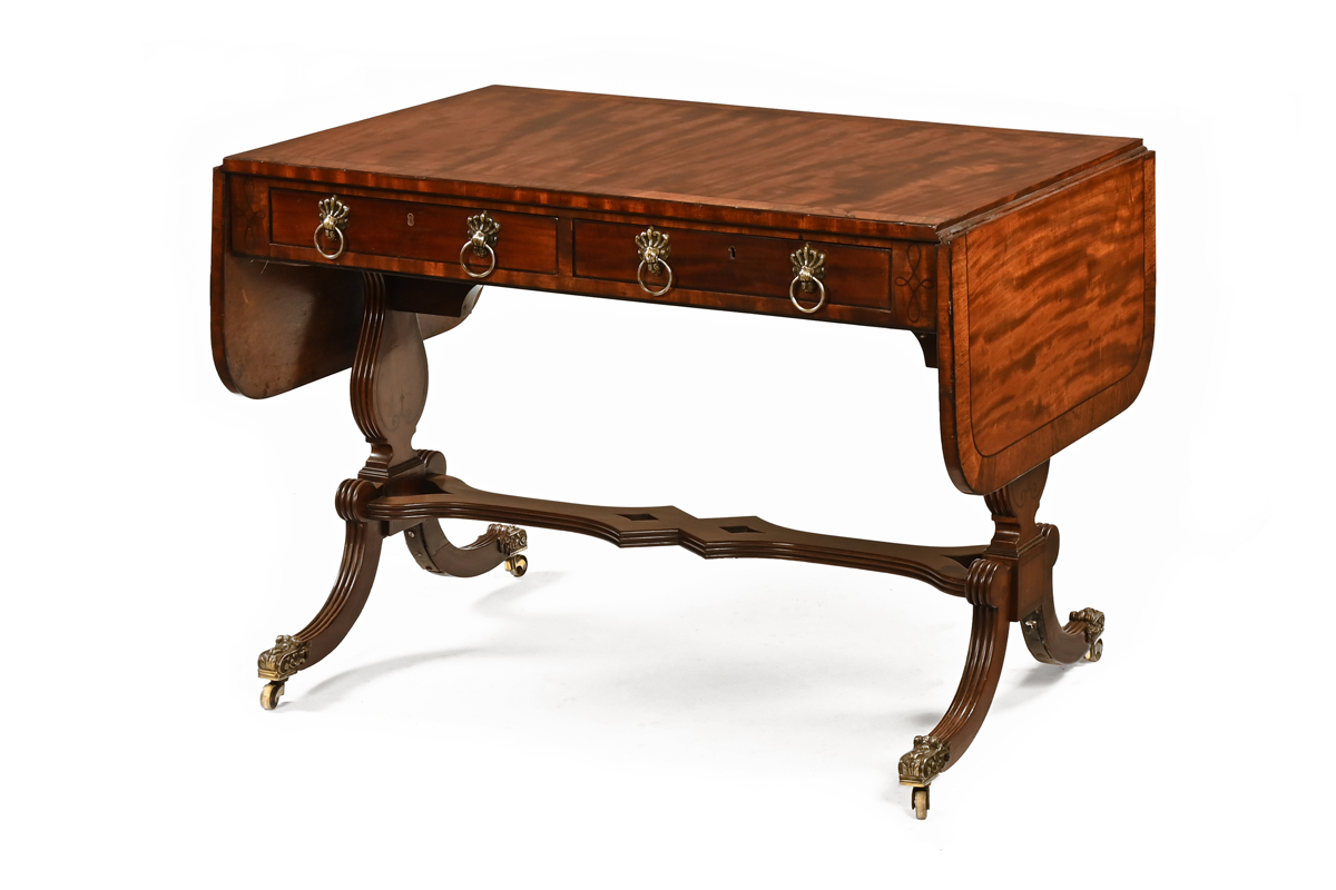 A Regency mahogany and rosewood banded sofa table,