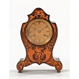 A 19th century rosewood and inlaid mantle clock, by Paul Garnier No.