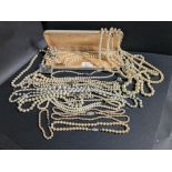 Cased set of synthetic pearls with white metal clasp and box of costume jewellery pearls