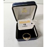 Yellow metal diamond set ring, size K,
