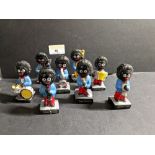 Eight hand painted Robertson Jam figurines