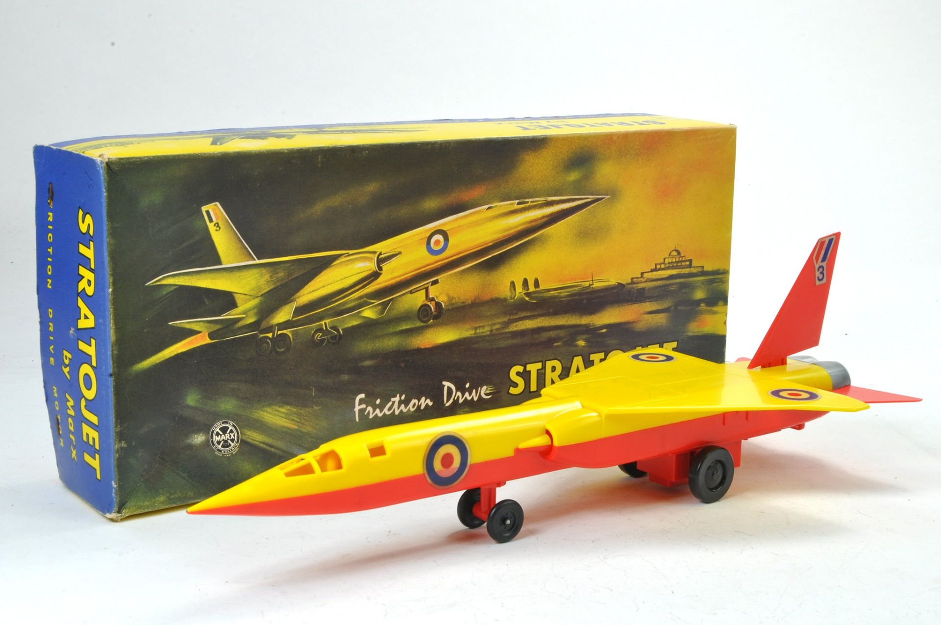 Marx Large Plastic Friction Driven Stratojet. Red and Yellow. Generlly very good, some tape on