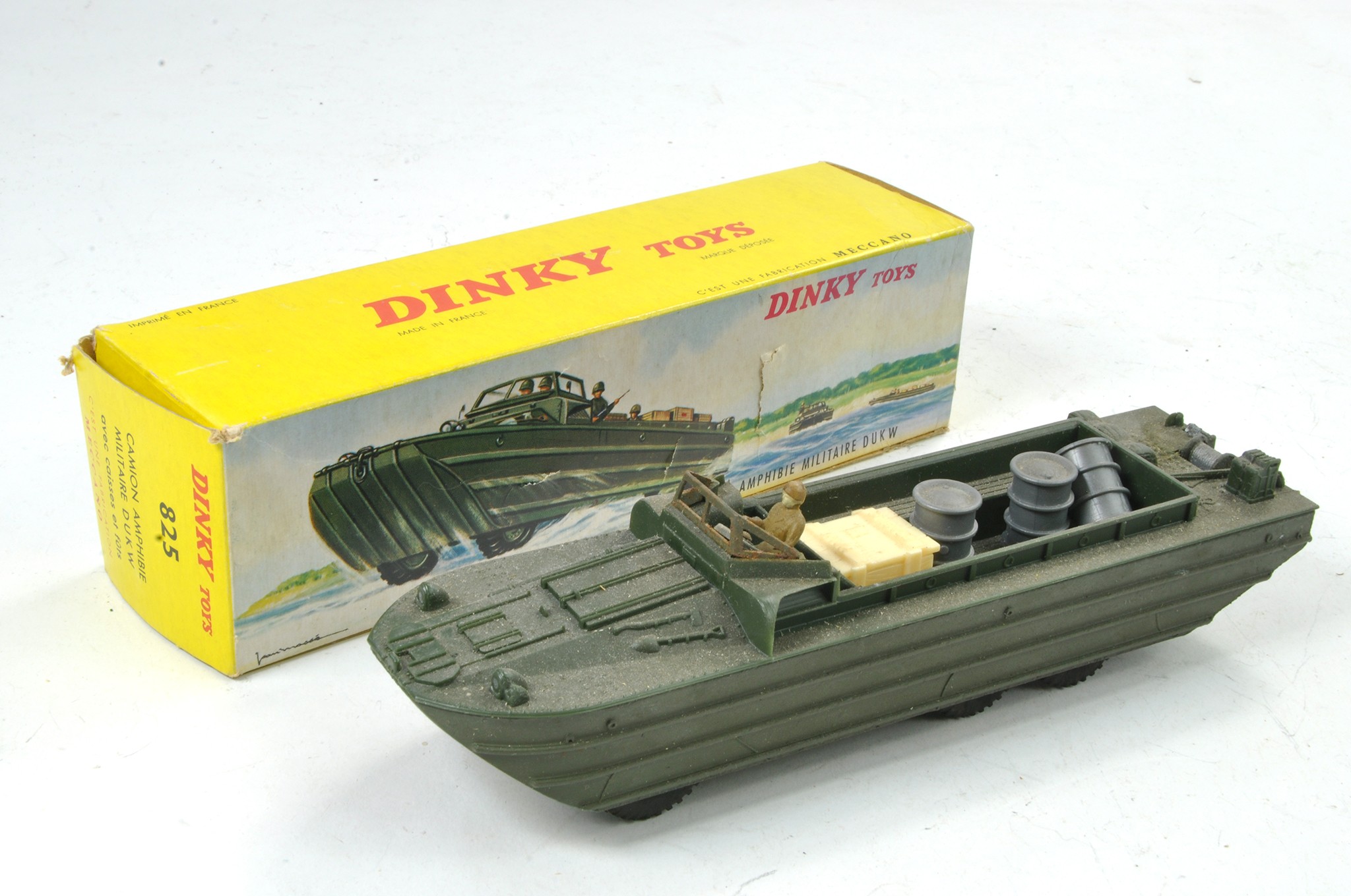French Dinky No. 825 DUKW. With Barrels and Crate plus figure. Dusty however still excellent, only