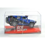 Slot car interest comprising SCX No. 63080 2006 Hummer H3 SUV Appears excellent in Original Box with
