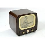 A rare Vintage 1950s Clockwork Bakelite Gantoy Phillips Television Musical Box. Screen shows a