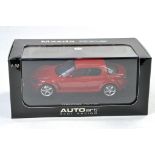 Slot car interest comprising Auto Art No. 13032 Mazda RX-8 (Velocity red) Slot car with lighting