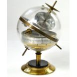Pedestal globe shaped brass and plastic barometer, hygrometer and thermometer. Unusual piece looks