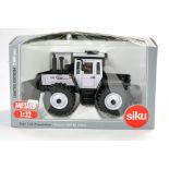 Siku 1/32 Model Farm Issue comprising MB Trac 1600 White Edition for Chartres 2009. Excellent,