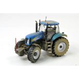 Britains 1/32 Code 3 - Weathered and Modified issue comprising New Holland T8040 Tractor. Appears