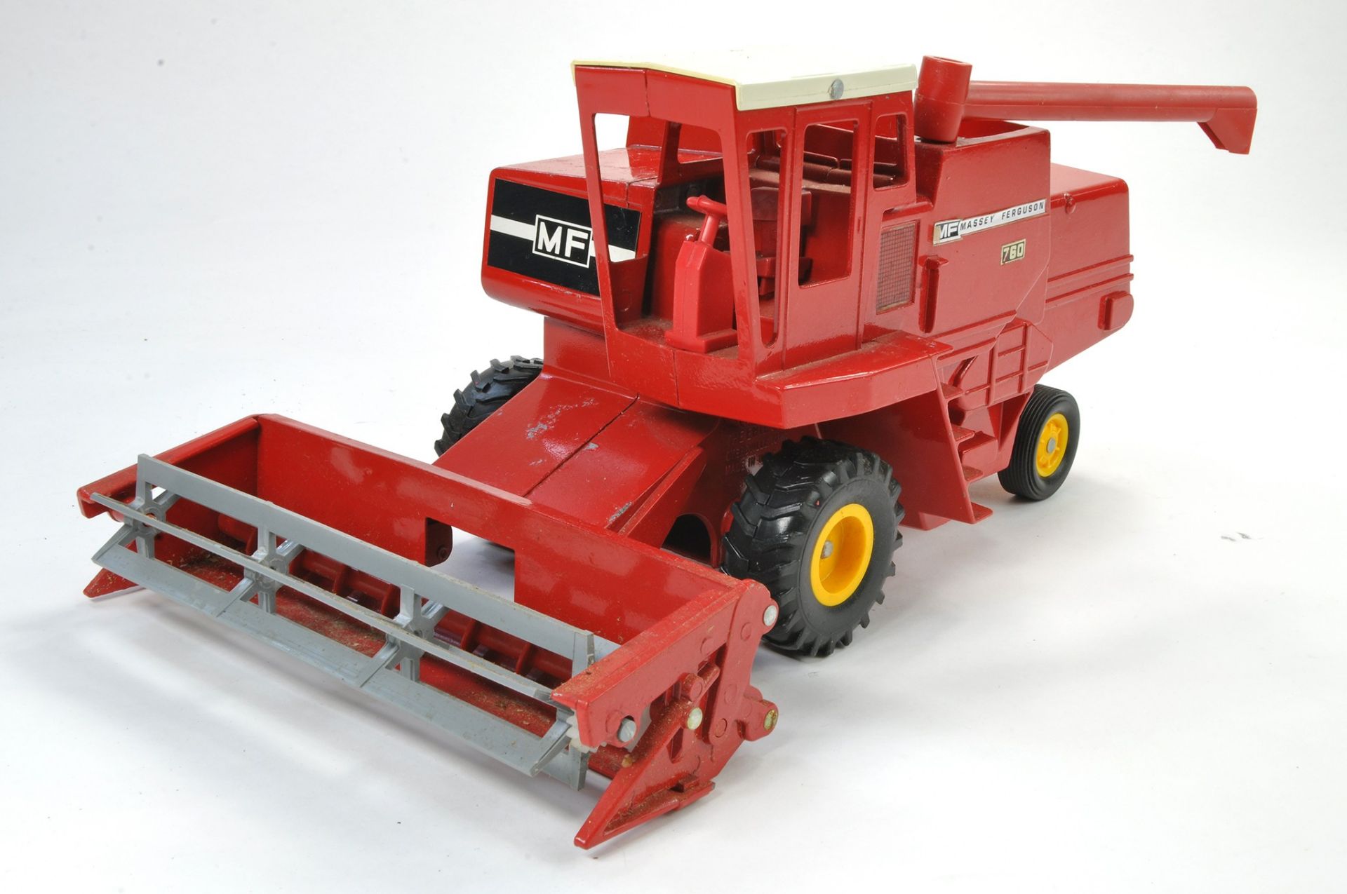 Ertl 1/16 Model Farm Issue comprising Massey Ferguson 760 Combine. Some Minor Marks throughout