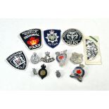 A selection of Canadian and New Zealand Police Badges.