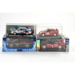 Four boxed diecast Rally Cars. Excellent with boxes.