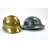 Pair of vintage helmets including early issue Police Helmet.