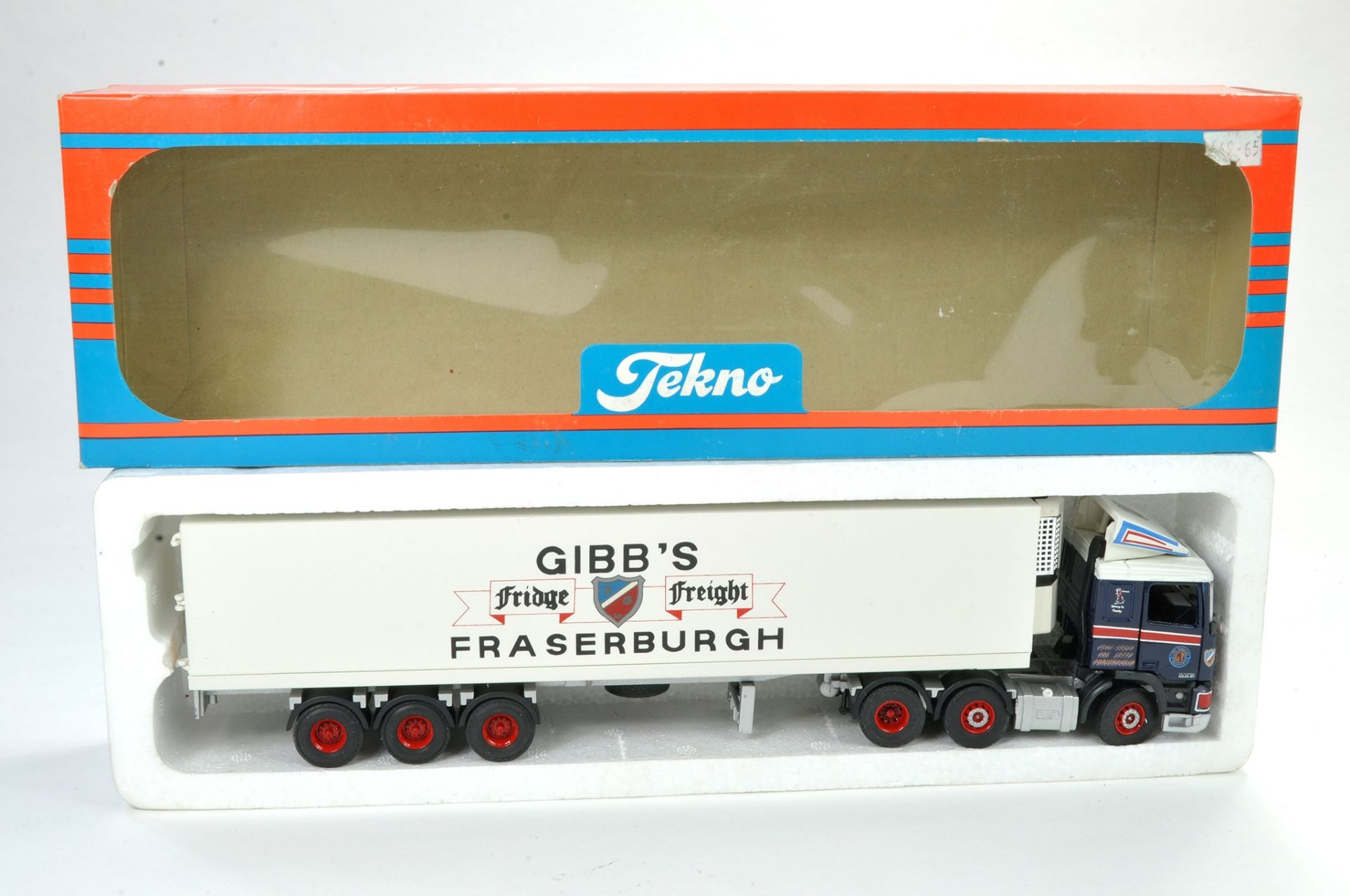 Tekno 1/50 Model Truck issue comprising Leyland DAF Fridge Trailer in the livery of Gibbs. Appears