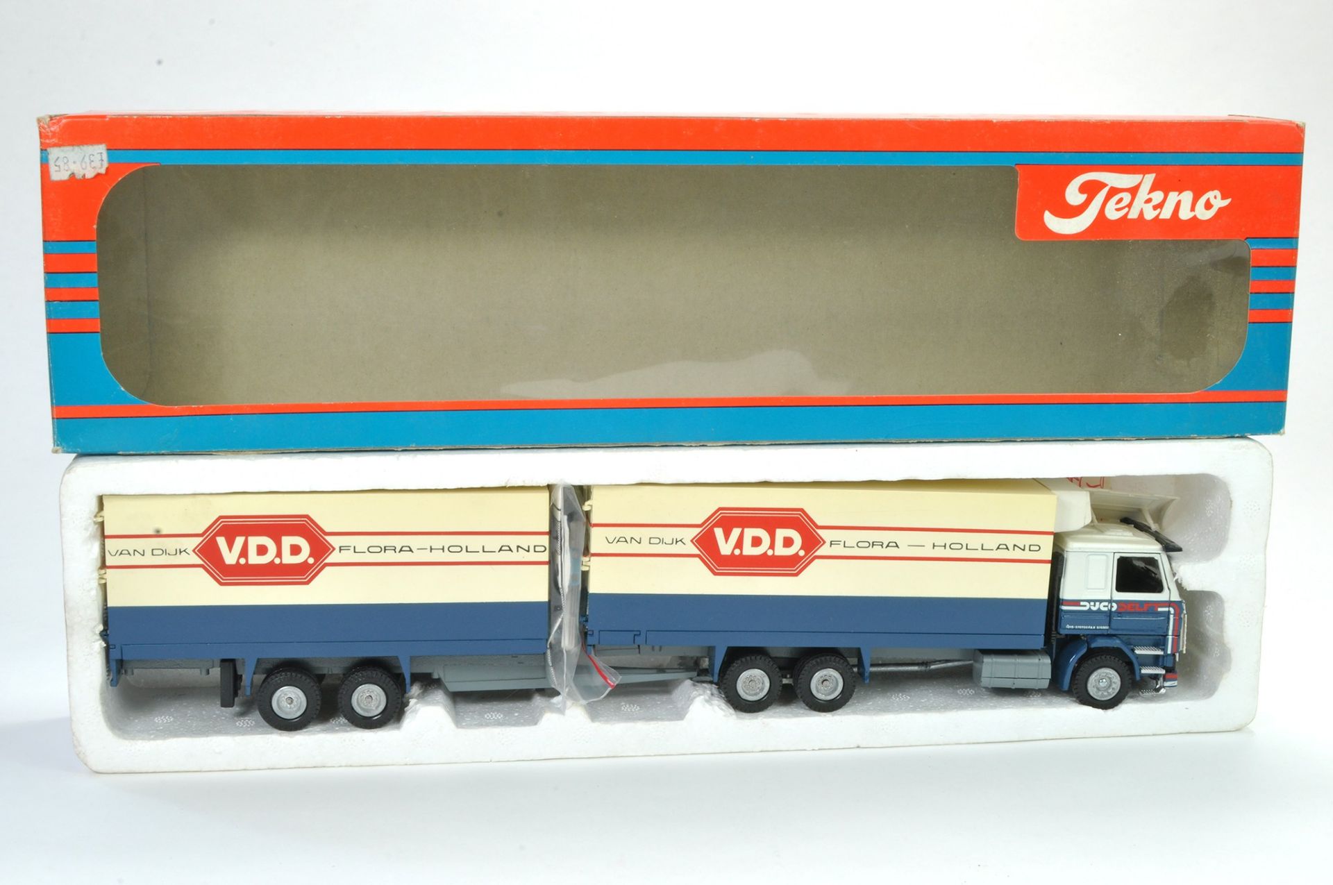 Tekno 1/50 Model Truck issue comprising Volvo drawbar trailer in the livery of VDD. Appears