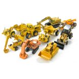 An interesting group of loose construction diecast, mostly NZG to include excavators, wheel loaders,