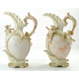 Pair of late 19th century German Ornamental Jugs with distinctively sculpted details including angel