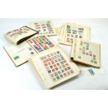 Stamps comprising a significant quantity of roughly kept albums including stamps of the world dating