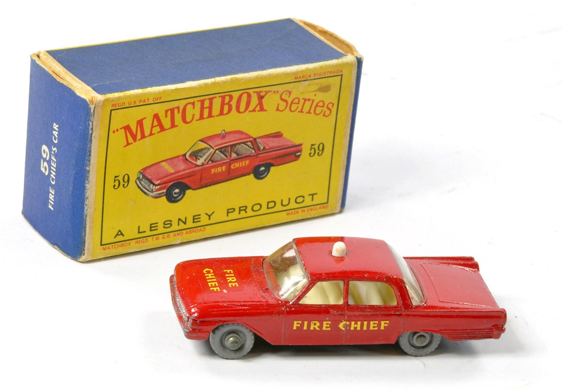 Matchbox Regular Wheels No. 59b Ford Fairlane Fire Chief Car. Red body with silver trim to front,