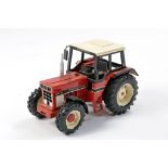 Scratch Built 1/32 farm issue comprising International 1255XL Tractor. An old hard to find example