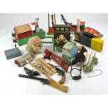 An assortment of well loved vintage toys and games including Meccano, various toy guns and