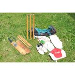 A collection of retro Cricket Equipment including Stumps, Bats, Clothing and Bag. Would benefit from