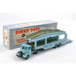 Dinky No. 582 Bedford Pullmore Car Transporter. Light blue cab and trailer with dark fawn platforms.